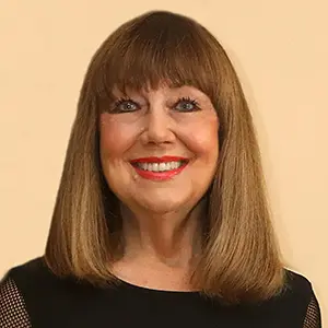 Headshot of Cherie Calbom, The Juice Lady, smiling, shown with her testimonial for Awespire Studios