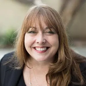 Headshot of Mary Agnes Antonopoulos smiling, shown with her testimonial for Awespire Studios